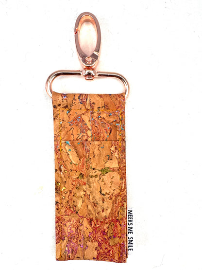 Cork keychain with a multi color pattern
